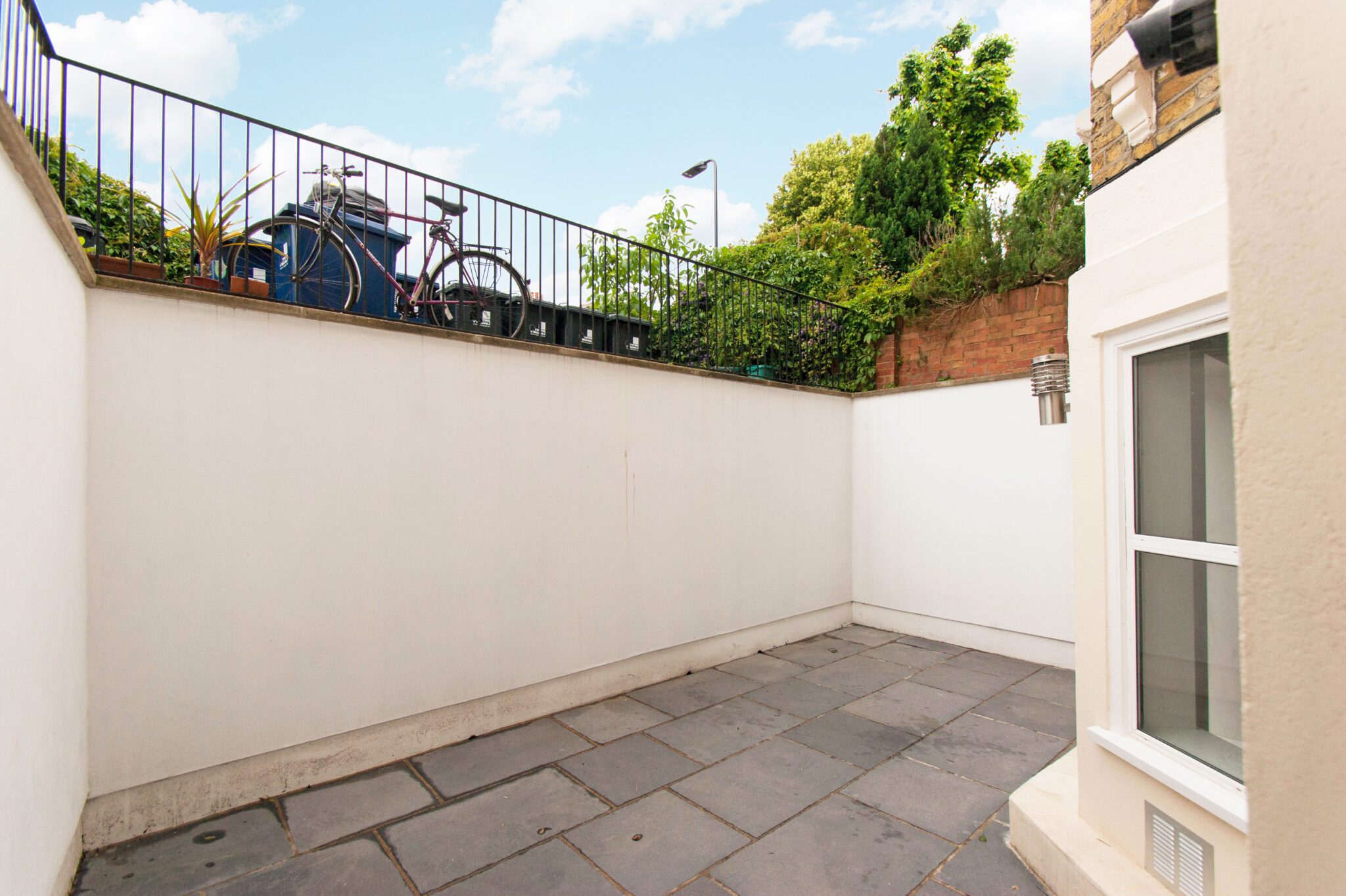 Converted one-bedroom apartment with private garden at Cumberland Park, Acton W3