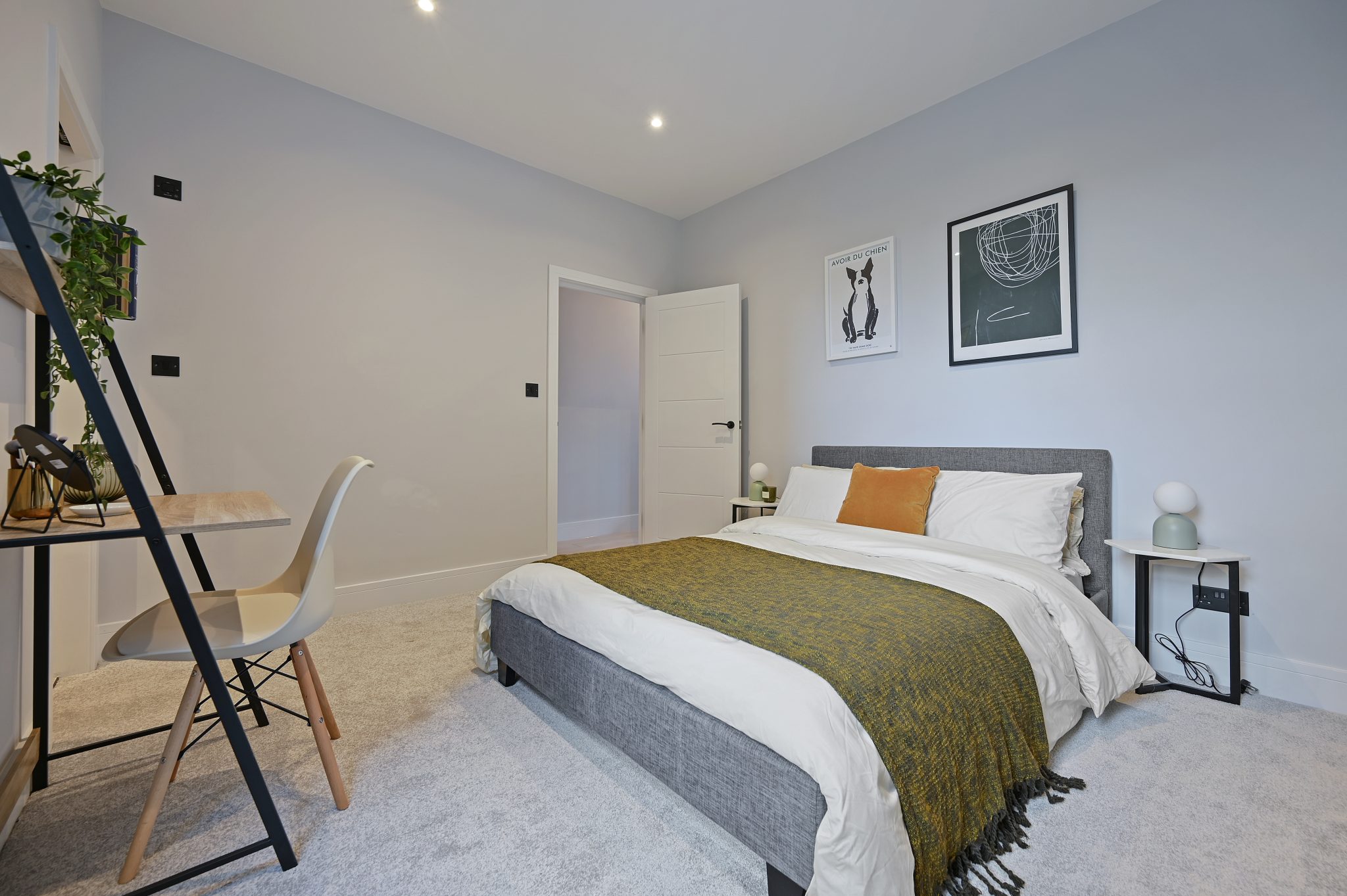 Open-plan reception and kitchen of the refurbished flat at Larden Road, Acton W3