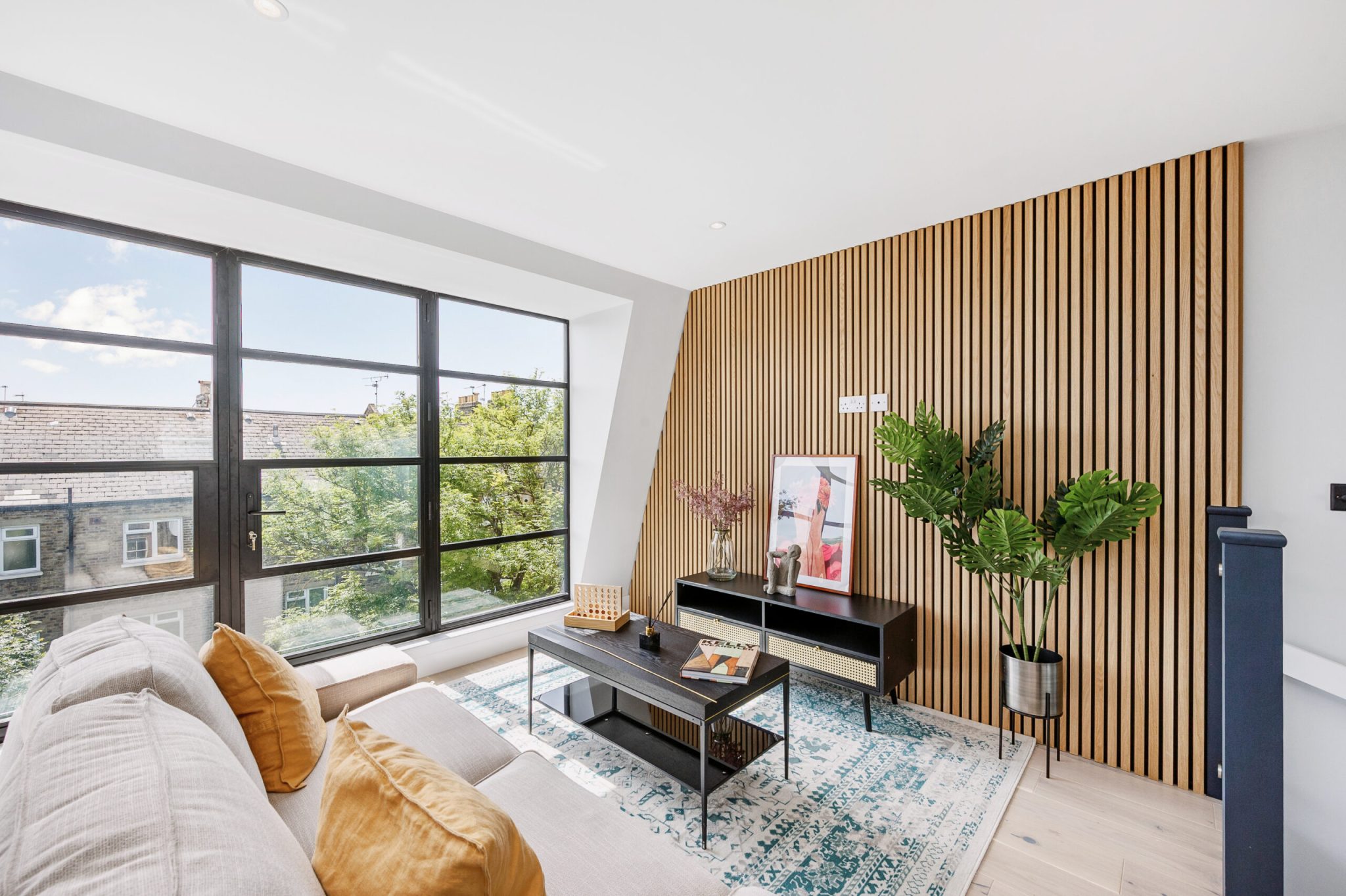High-specification three-bedroom home delivered at Netherwood Road in Brook Green, W14