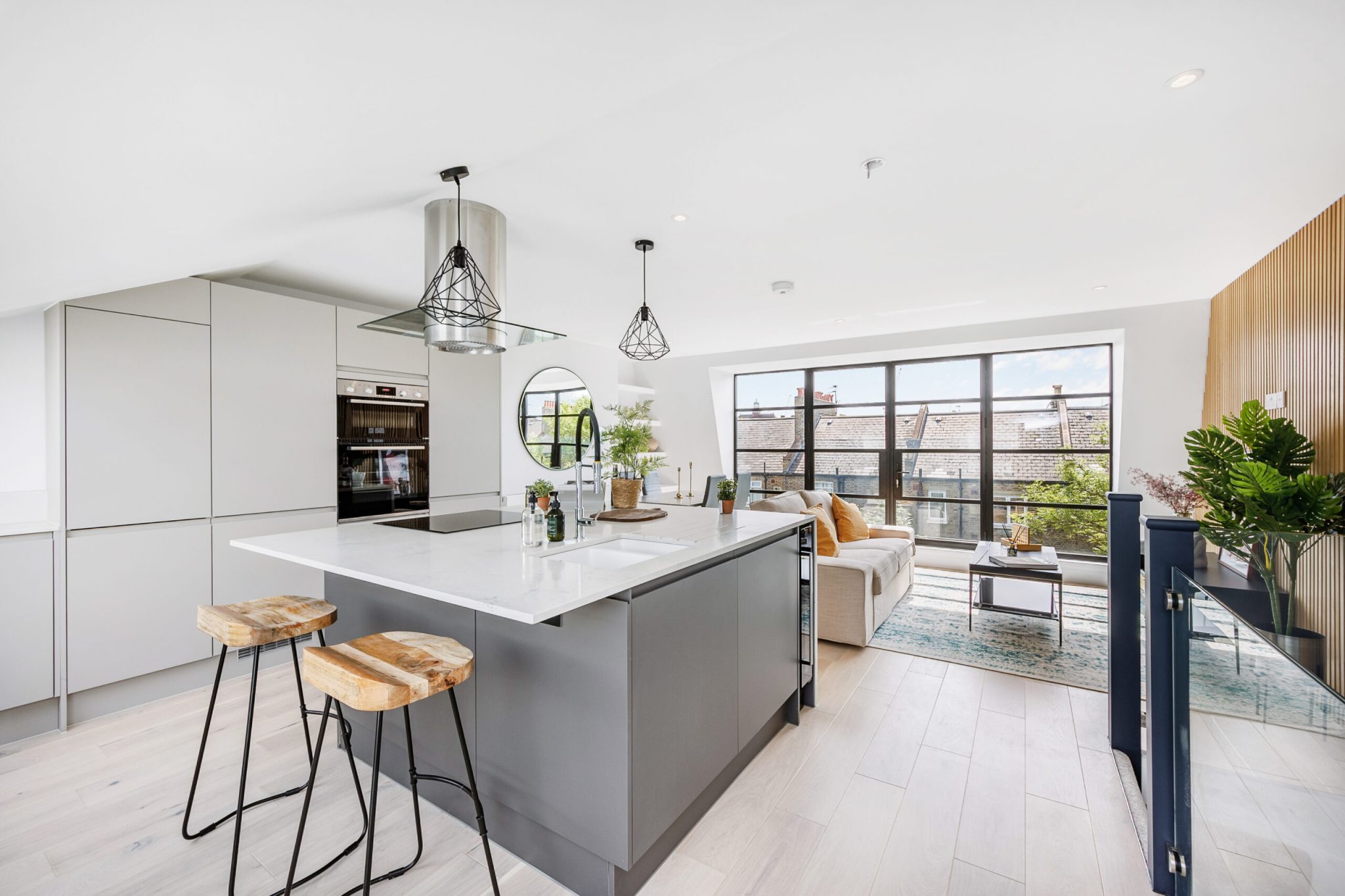 High-specification three-bedroom home delivered at Netherwood Road in Brook Green, W14