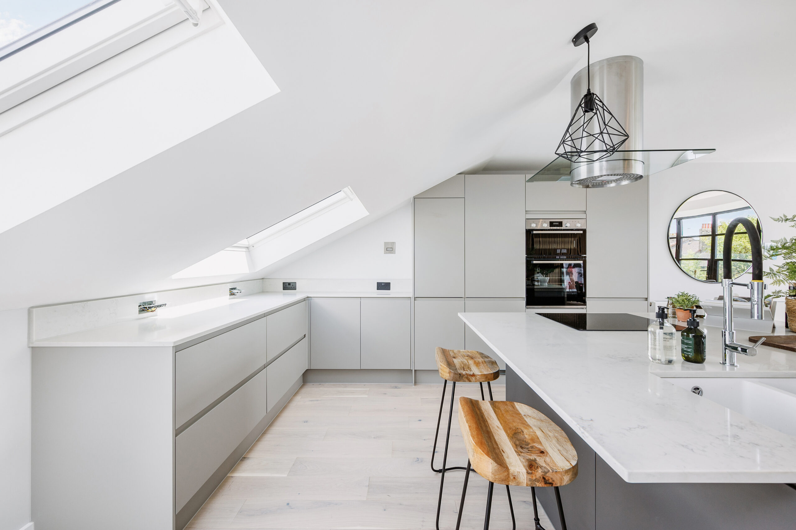 High-specification three-bedroom home delivered at Netherwood Road in Brook Green, W14