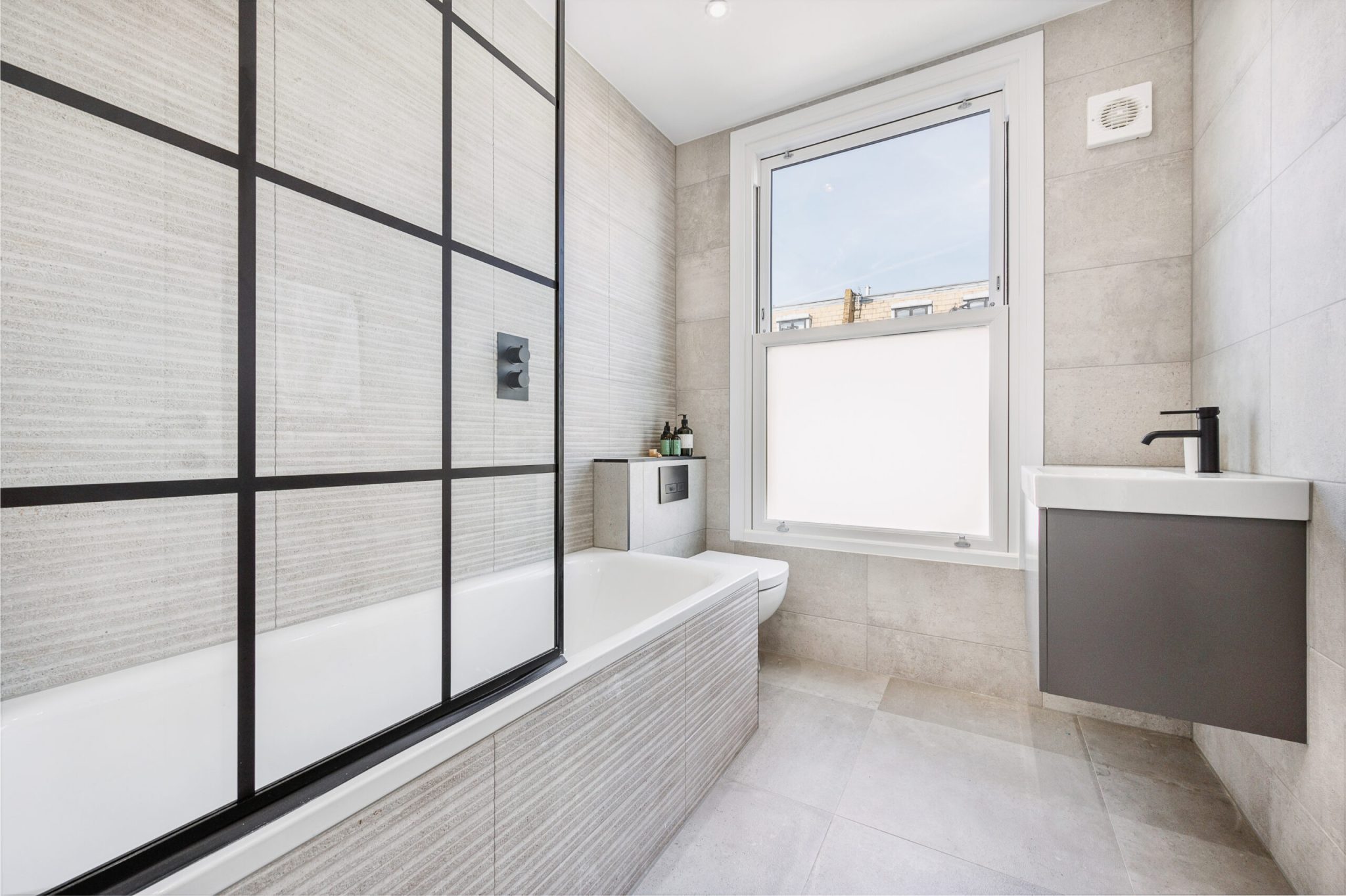 High-specification three-bedroom home delivered at Netherwood Road in Brook Green, W14